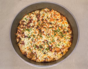 Arroz de pato gratinado com queijo mozzarella